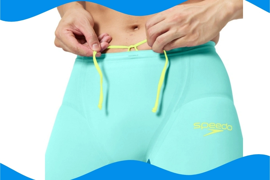 Advanced bonded seam race suit with compression panels